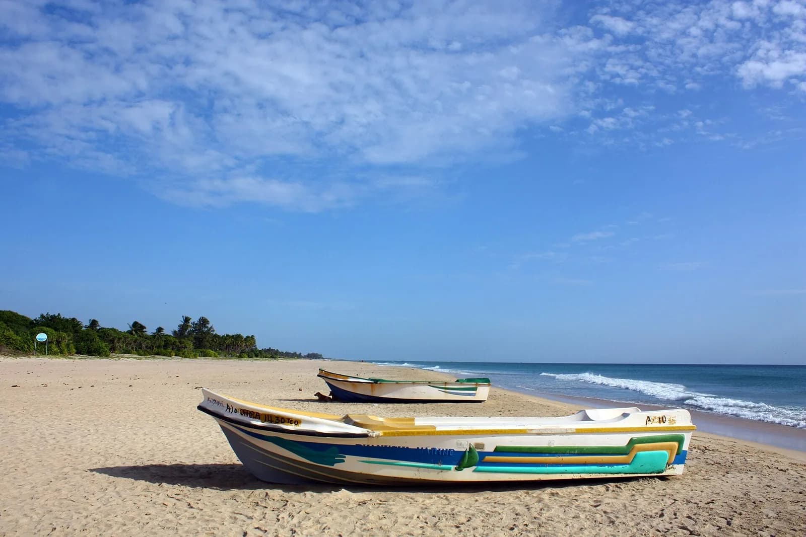 Pristine soft white sands and calm turquoise waters of Nilaveli Beach near Trincomalee Sri Lanka